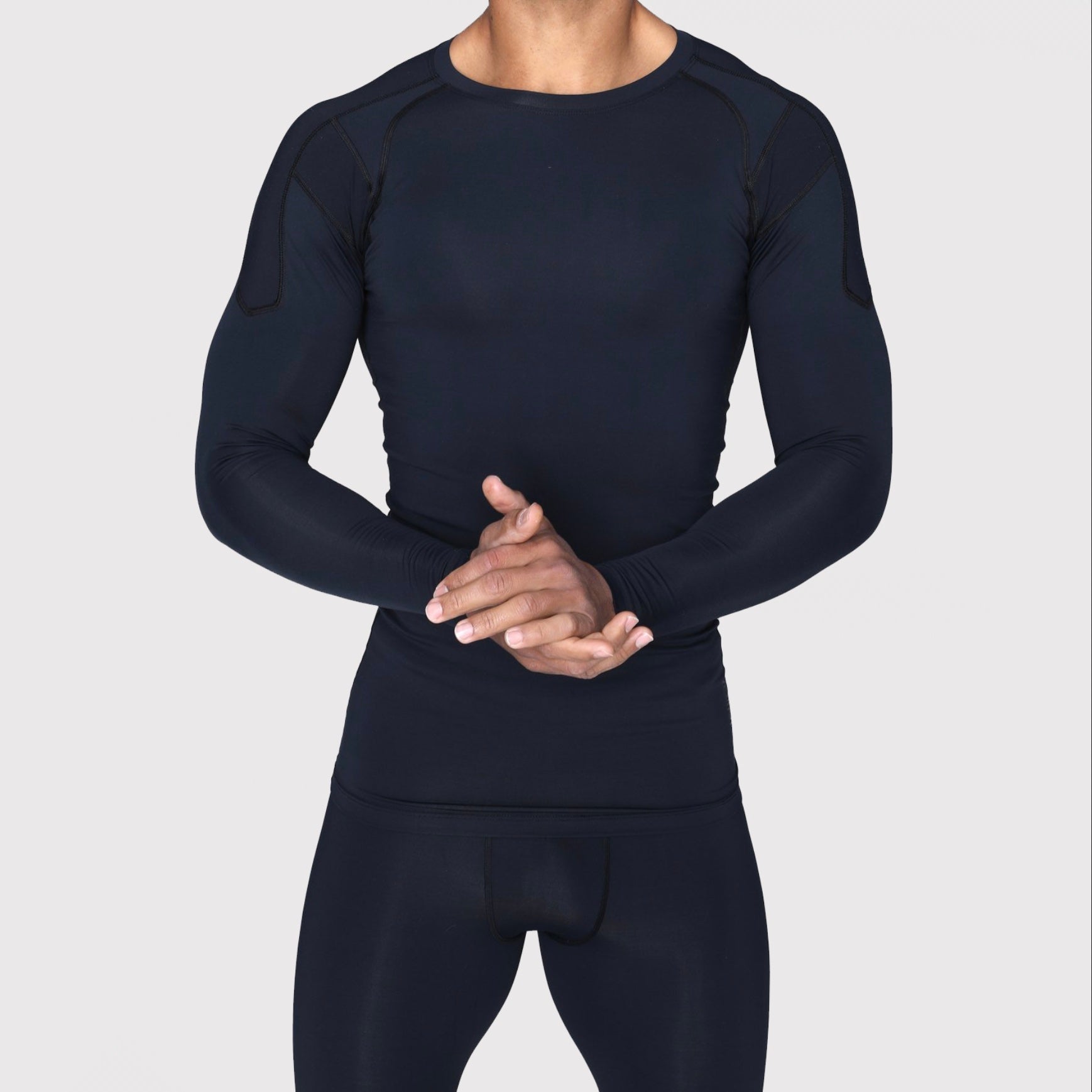 Men's compression shirts are versatile garments that offer both performance benefits and style options. When it comes to pairing