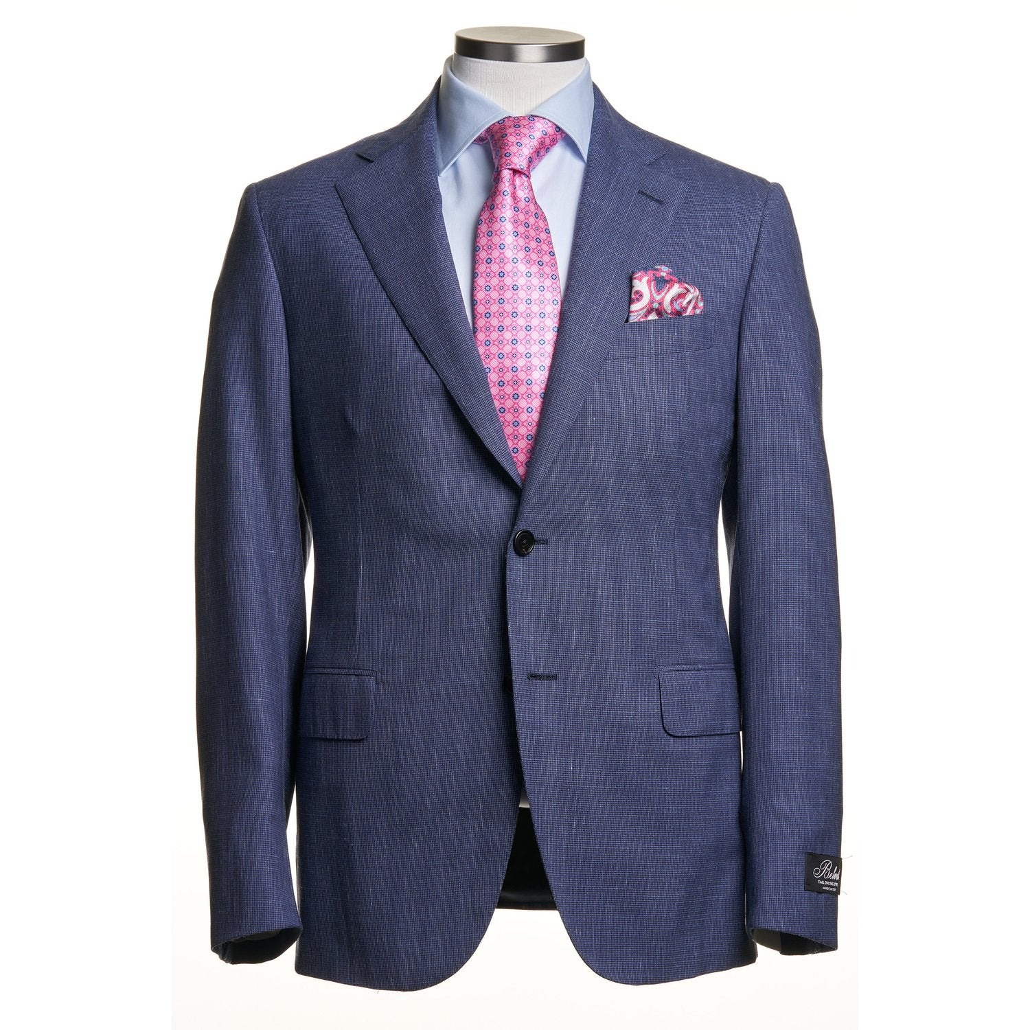 light blue suit with pink shirt