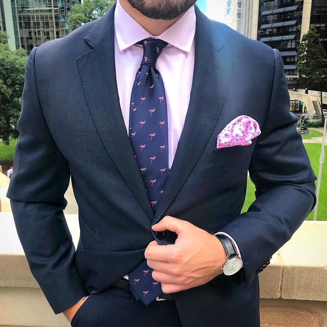 light blue suit with pink shirt